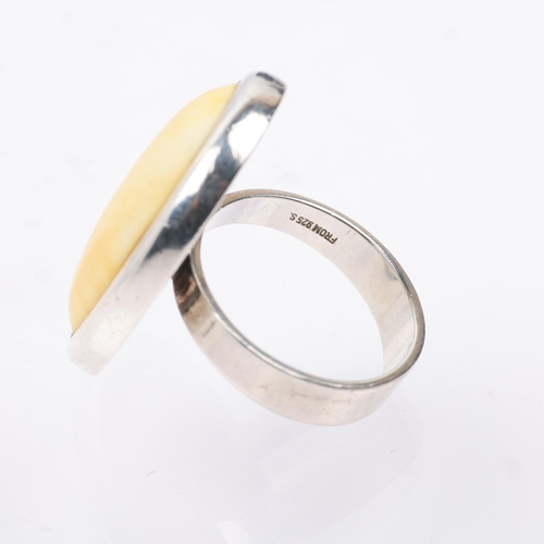 1516 - NIELS ERIK FROM - a Danish modernist sterling silver marine ivory dress ring, setting height 28.7mm,... 