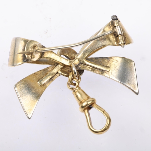 1521 - A Continental silver-gilt blue enamel ribbon bow brooch, with 9ct gold dog-clip, 34.6mm, 6.6g