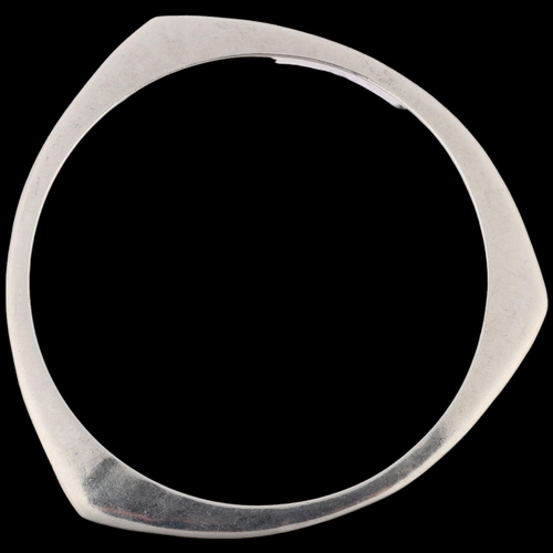 1527 - PANDORA - a sterling silver Reuleaux triangle slave bangle, band width 5.3mm, internal circumference... 