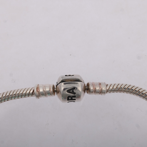 1529 - PANDORA - a sterling silver snake link charm bracelet, with 7 silver charms, 18cm, 31.3g