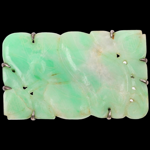 1533 - An early 20th century carved and polished jade floral panel brooch, apparently unmarked, 60.1mm, 32.... 