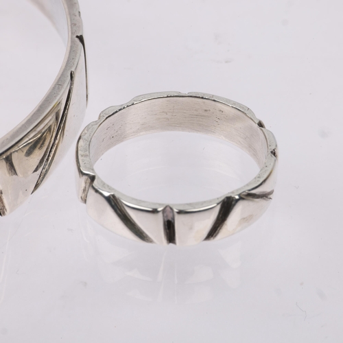 1550 - DEN-PERMANENTE - a Danish modernist sterling silver handicraft matching slave bangle and band ring, ... 