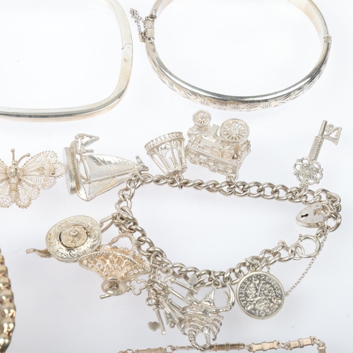 1565 - Various silver jewellery, including charm bracelet, scarf rings, christening bangle, etc, 200g gross