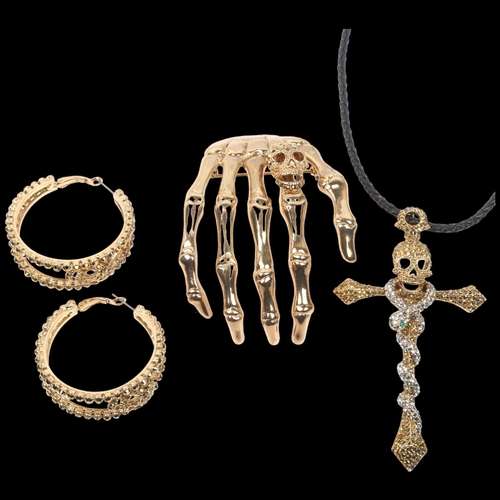 1574 - BUTLER & WILSON - a Vintage gilt-metal rhinestone skull jewellery set, comprising snake cross pendan... 