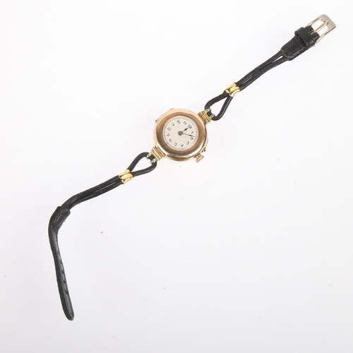 1031 - A lady's early 20th century 9ct gold mechanical wristwatch, circa 1916, silvered engine turned sunbu... 