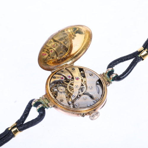 1031 - A lady's early 20th century 9ct gold mechanical wristwatch, circa 1916, silvered engine turned sunbu... 