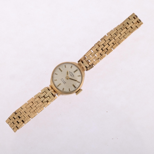 1032 - ROTARY - a lady's 9ct gold mechanical bracelet watch, silvered dial with applied gilt baton hour mar... 