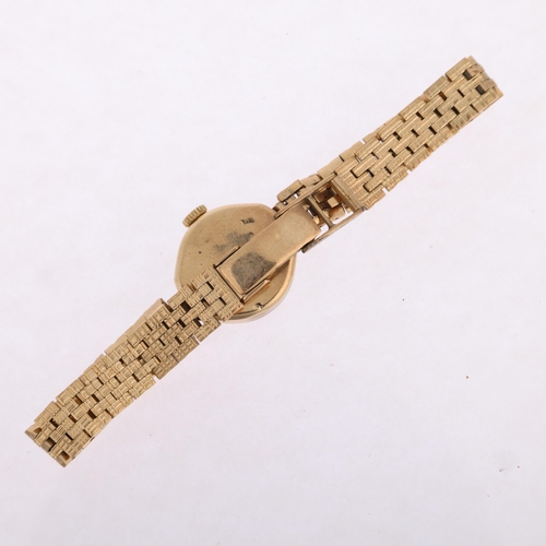 1032 - ROTARY - a lady's 9ct gold mechanical bracelet watch, silvered dial with applied gilt baton hour mar... 