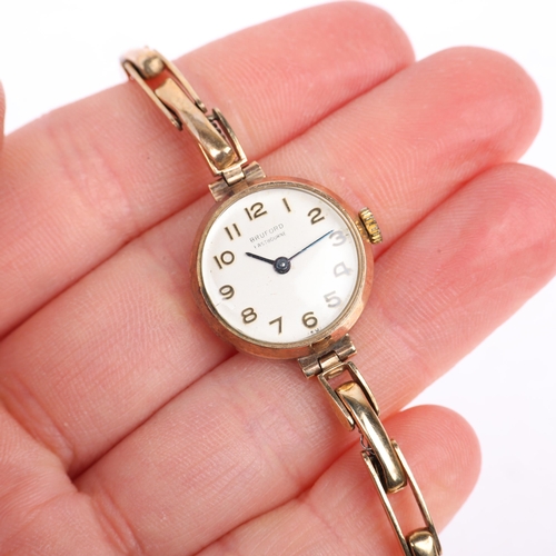 1036 - A lady's 9ct gold mechanical wristwatch, by Bruford of Eastbourne, ref. 77812, circa 1960s, silvered... 
