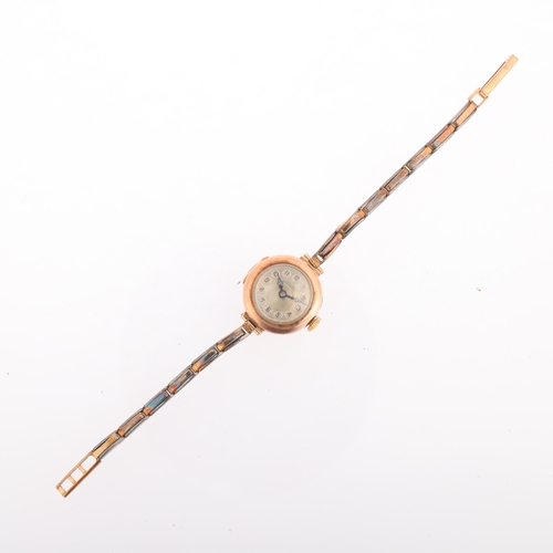 1040 - A lady's 9ct rose gold mechanical bracelet watch, by Douglas of Stourbridge, silvered dial with Arab... 