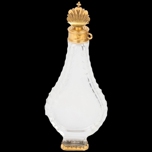 1612 - An 18th century French Louis XV gold-mounted crystal glass pear-shaped slimline scent bottle, circa ... 