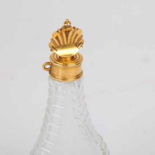 1612 - An 18th century French Louis XV gold-mounted crystal glass pear-shaped slimline scent bottle, circa ... 