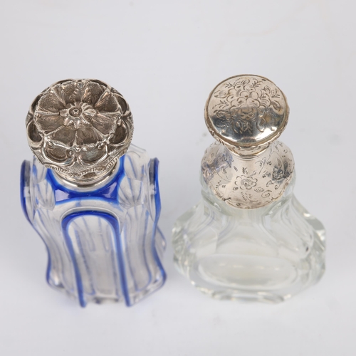 1613 - A 19th century French silver-mounted glass pear scent bottle, and a silver-mounted blue overlay glas... 