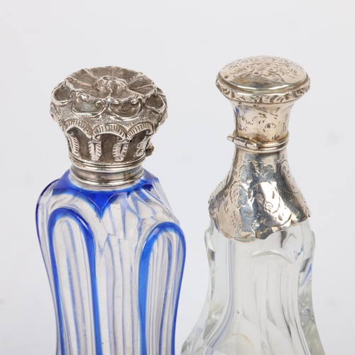 1613 - A 19th century French silver-mounted glass pear scent bottle, and a silver-mounted blue overlay glas... 