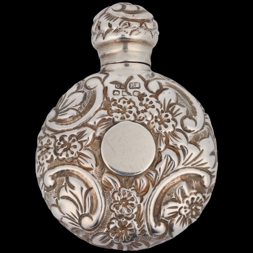 1614 - A Victorian silver moon scent flask, Saunders & Shepherd, Chester 1890, allover relief embossed flor... 