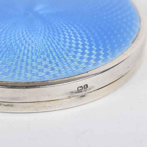 1623 - An Art Deco George V silver and blue enamel compact, William Devenport, Birmingham 1929, circular fo... 