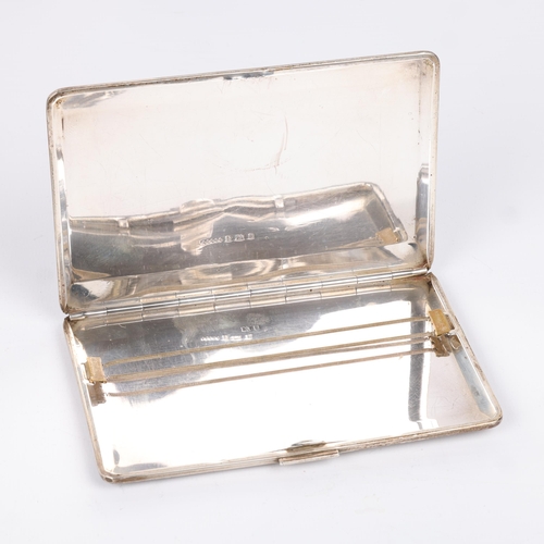 1632 - An Art Deco style George VI silver rectangular cigarette case, Harman Brothers, Birmingham 1951, all... 