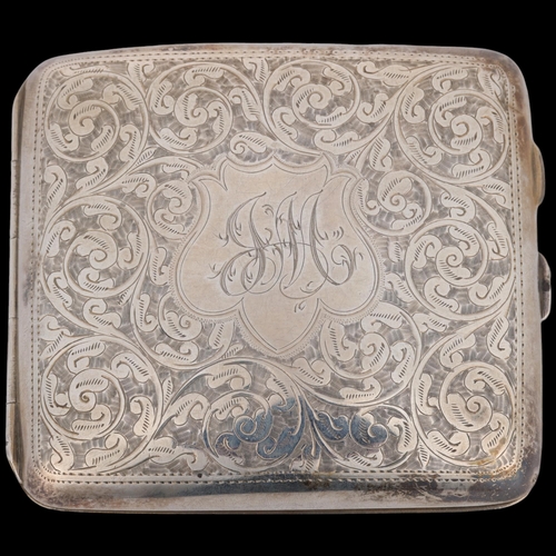 1638 - A George V curved silver cigarette case, William Aitken, Birmingham 1916, square form with allover f... 