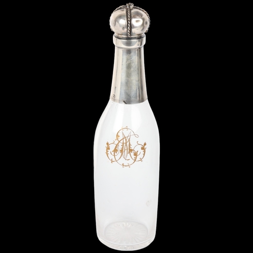 1647 - An unusual Antique French silver-mounted glass 'Champagne Bottle' decanter, Paris, circa 1900, with ... 