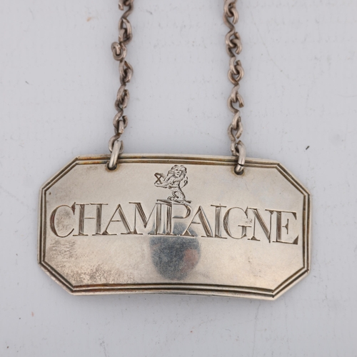 1648 - A George II silver heraldic Champaigne wine label, Susanna Barker, London circa 1790 (no date letter... 