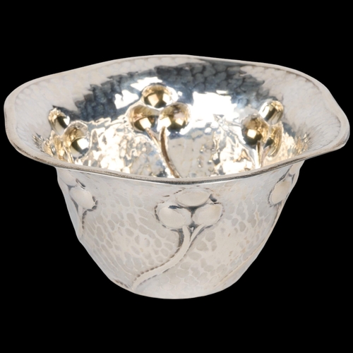 1653 - An Arts and Crafts silver bowl, Coles & Fryer, Birmingham 1903, shaped circular form with stylised f... 