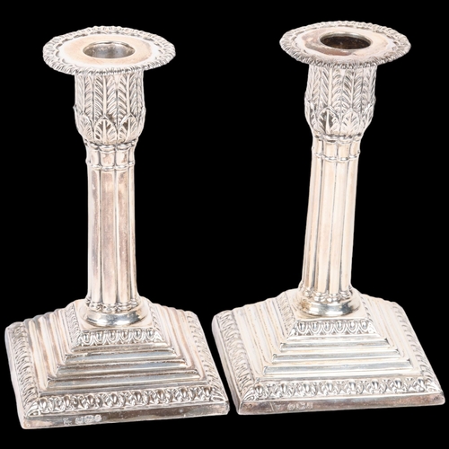 1669 - A pair of late Victorian silver Grecian Revival table candlesticks, James Deakin & Son, Sheffield 18... 