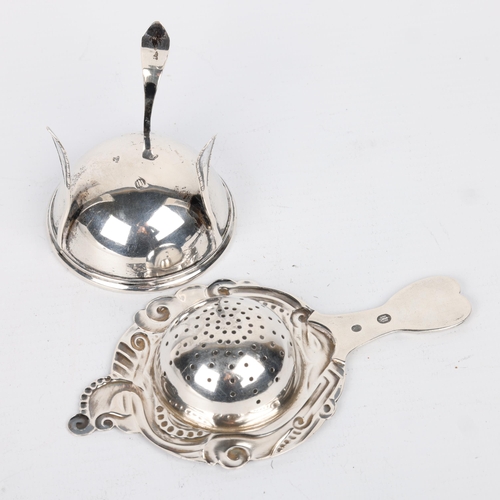 1675 - An Art Nouveau Danish silver tea strainer and stand, circa 1917 and 1920, strainer 13cm, stand heigh... 