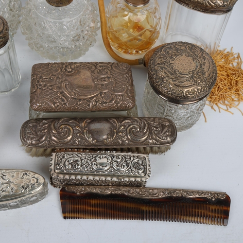 1687 - A group of Edwardian silver-mounted glass dressing table items, mostly Walker & Hall, Sheffield 1904... 