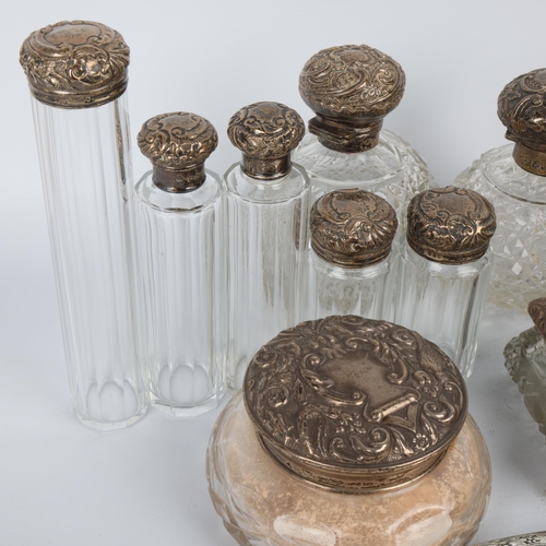 1687 - A group of Edwardian silver-mounted glass dressing table items, mostly Walker & Hall, Sheffield 1904... 