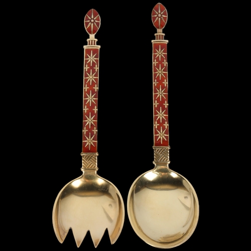 1688 - J TOSTRUP - a pair of Norwegian modernist sterling silver-gilt red enamel servers, Oslo circa 1940, ... 