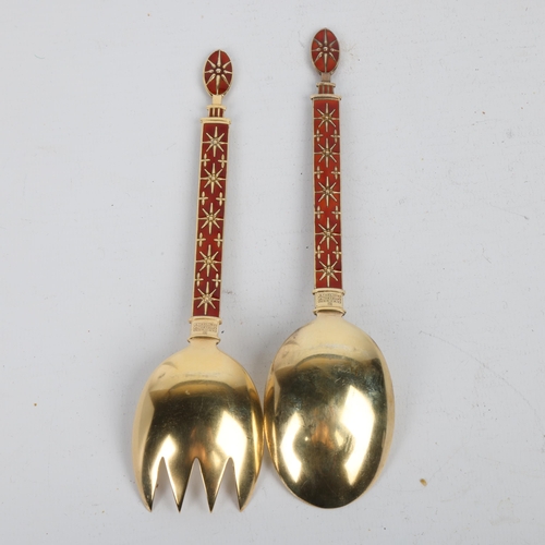 1688 - J TOSTRUP - a pair of Norwegian modernist sterling silver-gilt red enamel servers, Oslo circa 1940, ... 