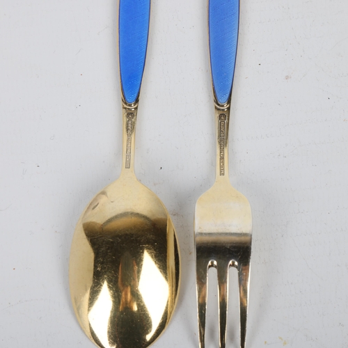 1692 - J TOSTRUP - a Norwegian vermeil sterling silver and blue enamel fork and spoon set, 14cm