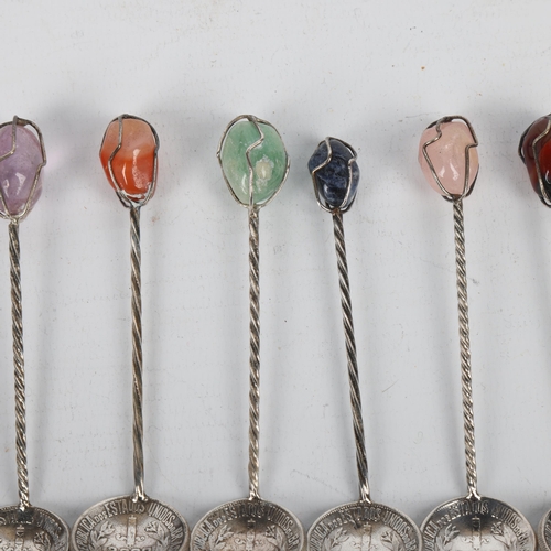 1699 - A set of 6 Brazilian silver 2000 Reis coin coffee spoons, each set with hardstone terminal and spira... 