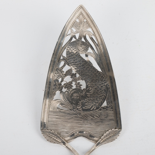 1707 - An 18th century Continental silver fish serving slice, indistinct marks, pierced and bright-cut engr... 