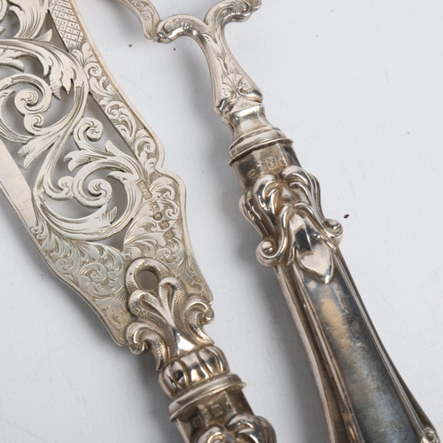 1708 - A pair of Victorian silver fish servers, Hilliard & Thomason, Birmingham 1853, knife 32cm, 8.3oz gro... 