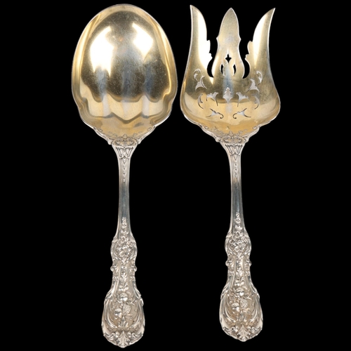 1710 - A pair of American sterling silver dessert servers, William Wise & Son, relief cast fruit and acanth... 