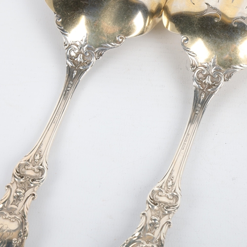 1710 - A pair of American sterling silver dessert servers, William Wise & Son, relief cast fruit and acanth... 