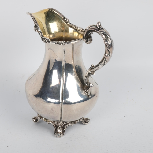 1717 - An early Victorian silver pumpkin cream jug, Richard Devonshire, London 1848, baluster form with cas... 