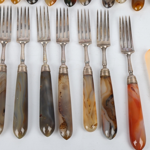 1725 - A group of 19th century lace agate handled silver plated dessert cutlery, comprising 8 forks, 11 kni... 