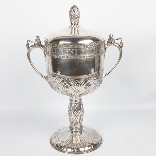 1733 - An impressive and unique Arts and Crafts George V silver 2-handled presentation trophy cup and cover... 