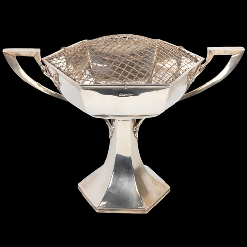 1734 - A large Art Nouveau George V silver 2-handled pedestal trophy cup, Walker & Hall, Sheffield 1913, he... 