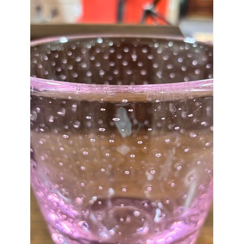 239 - MARJA HEPO-AHO, Finland, a small vase in pink glass with controlled bubbles produced with a hedgehog... 