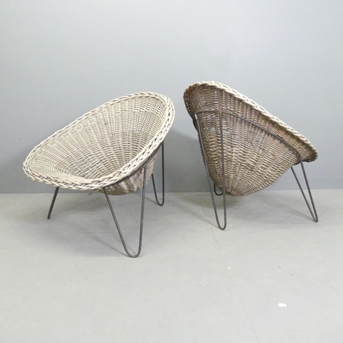 93 - A pair of mid-century style rattan cone chairs designed by Terence Conran.