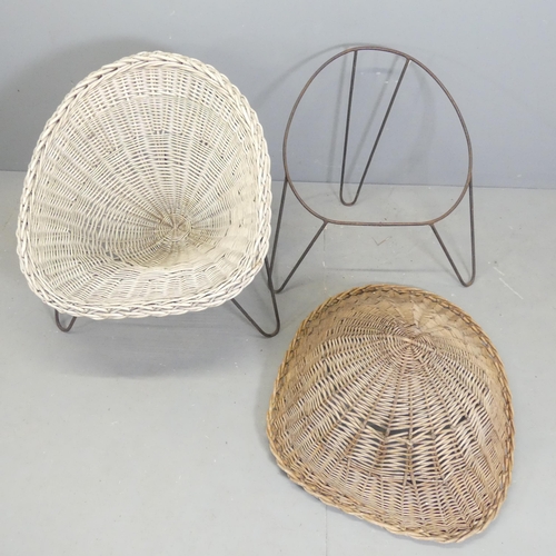 93 - A pair of mid-century style rattan cone chairs designed by Terence Conran.