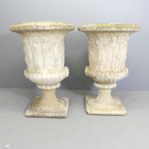 98 - A pair of reconstituted stone two-section Grecian design garden urns on stands. 65x90cm.