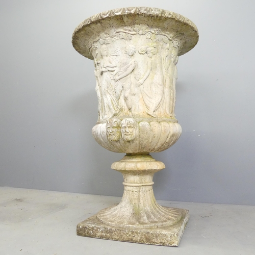 99 - A reconstituted stone Grecian design garden urn on stand. Indistinctly signed. 64x93cm.