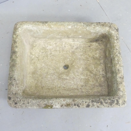 103 - A weathered concrete sink. 60x14x48cm.