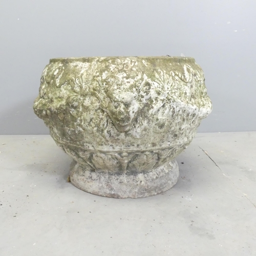 106 - A weathered concrete garden urn with moulded decoration. 50x33cm.