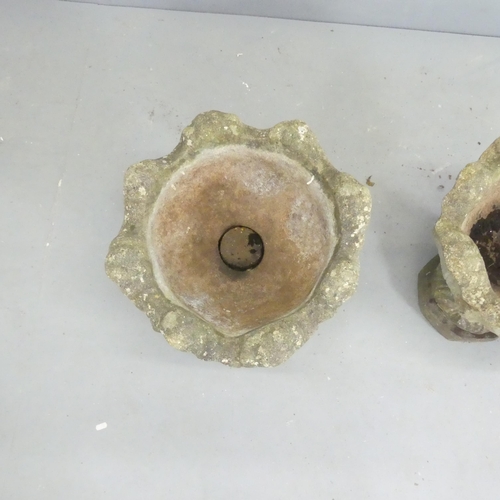 108 - A pair of two section weathered concrete garden urns. 47x44cm.