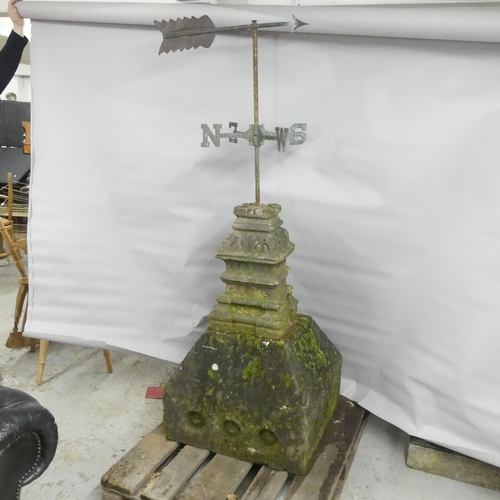 120 - A Victorian copper weathervane mounted on weathered natural stone base and plinth. 60x166x60cm.